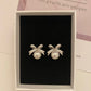 Bowknot pearl stud earrings