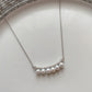 Smile pendent pearl necklace